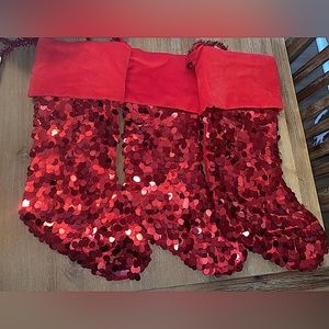 3 red sequin stockings. Used a couple of years. In great condition.